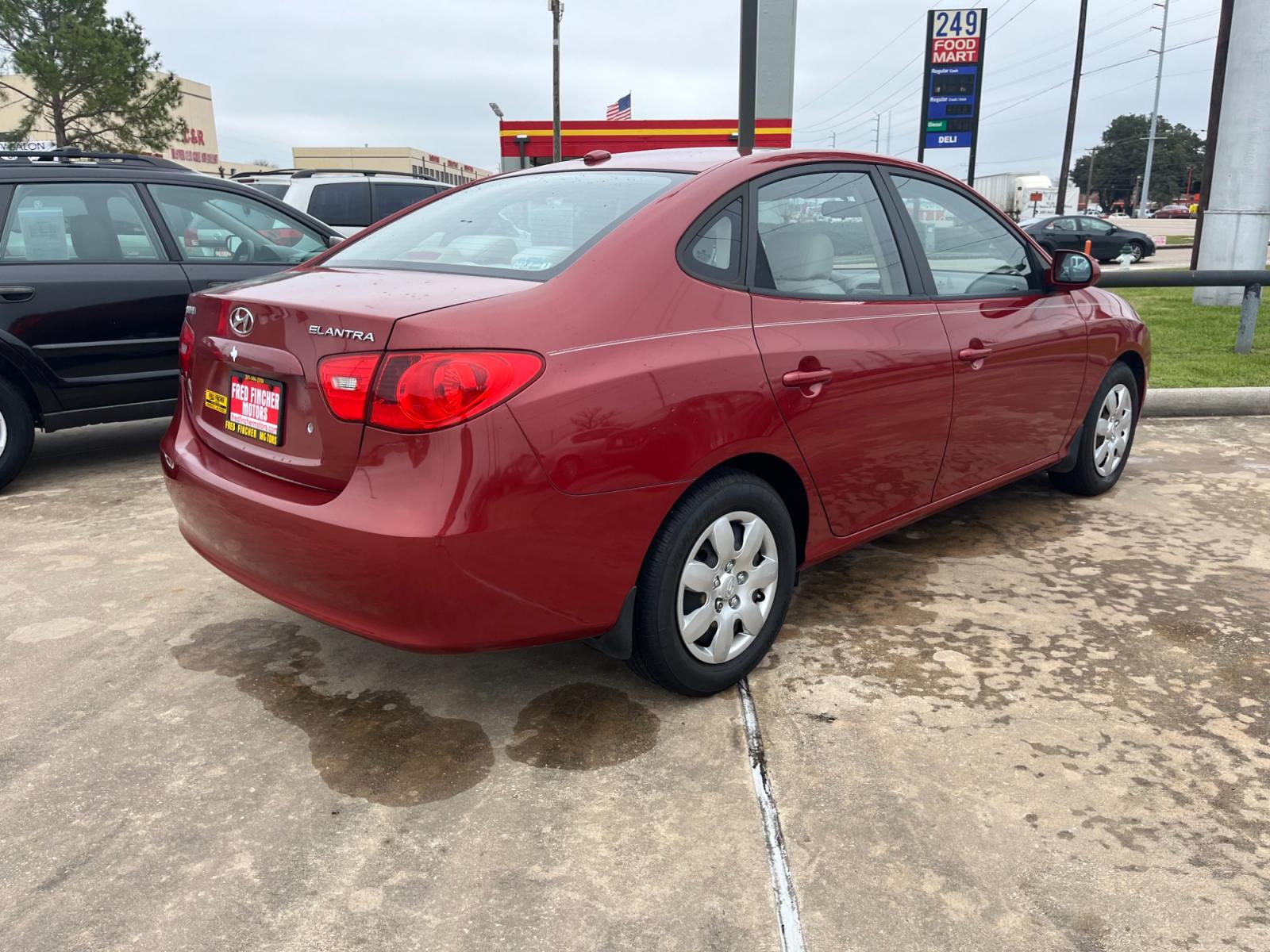 2008 red /TAN Hyundai Elantra GLS (KMHDU46D78U) with an 2.0L L4 DOHC 16V engine, Manual transmission, located at 14700 Tomball Parkway 249, Houston, TX, 77086, (281) 444-2200, 29.928619, -95.504074 - Photo #6
